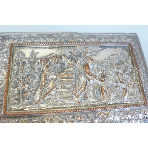 643 - A plate on copper embossed jewellery casket, 14.5cm width