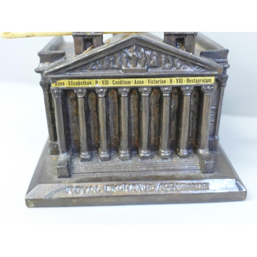 648 - A Royal Exchange Assurance cast metal novelty inkwell