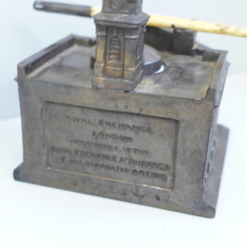 648 - A Royal Exchange Assurance cast metal novelty inkwell