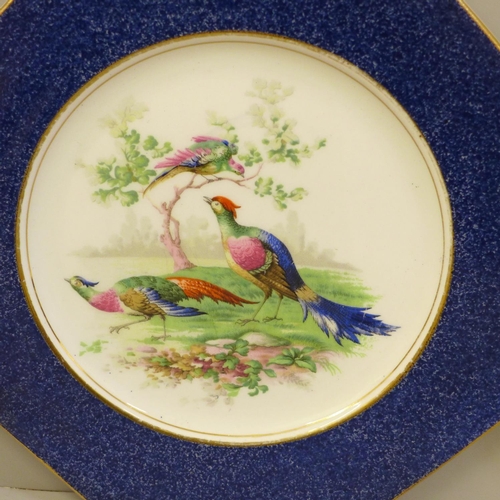 651 - Two Wedgwood & Co. Imperial Porcelain octagonal side plates decorated with birds