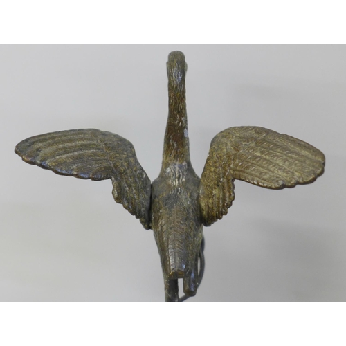 656 - A bronze model of a bird standing on a turtle, on a quartz base