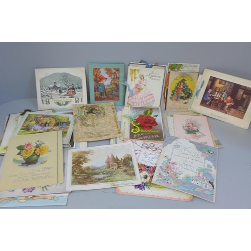 664 - A collection of Mabel Lucie Attwell and other postcards and a bundle of early greeting cards