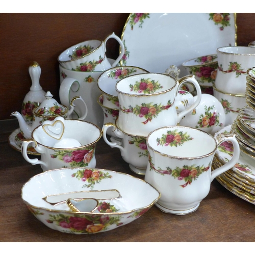 668 - A collection of Royal Albert Old Country Roses including a cake stand, fourteen side plates, six bow... 