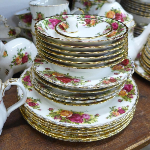 668 - A collection of Royal Albert Old Country Roses including a cake stand, fourteen side plates, six bow... 