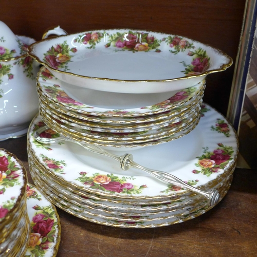 668 - A collection of Royal Albert Old Country Roses including a cake stand, fourteen side plates, six bow... 