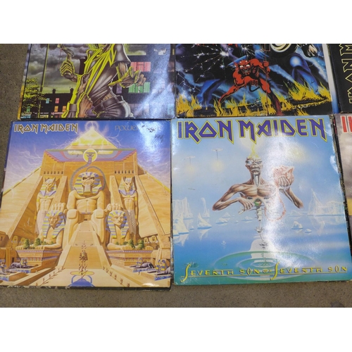 680 - A collection of eight Iron Maiden LP records and nine 12