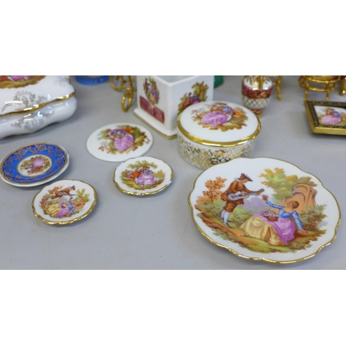 685 - A collection of Limoges china including vases, trinket pots, miniature furniture, etc.
**PLEASE NOTE... 