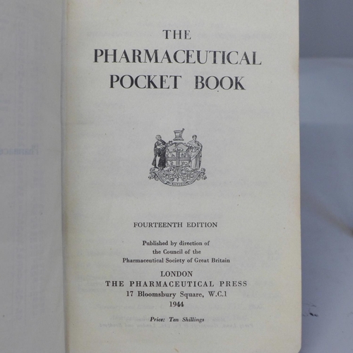 693 - An Amal Bunsen burner and one volume, The Pharmaceutical Pocket Book and anatomy ephemera