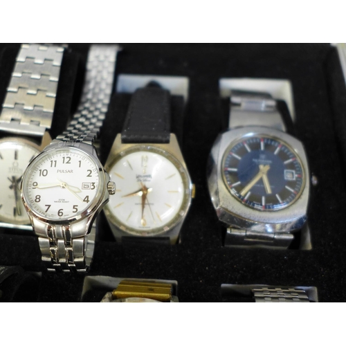 700 - A case of wristwatches including Tara, Rotary, Mondaine, Newark and Titus