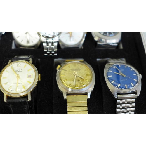 700 - A case of wristwatches including Tara, Rotary, Mondaine, Newark and Titus