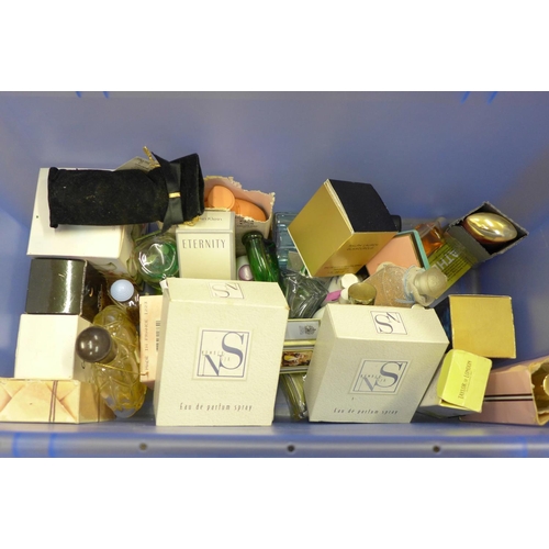 711 - A box containing used perfumes including Chanel No 5