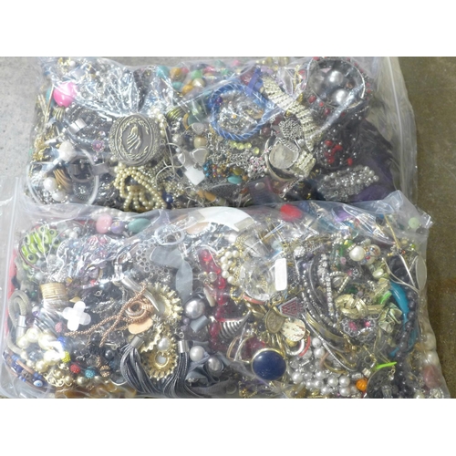 717 - Two large bags of costume jewellery