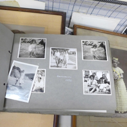 724 - A suitcase containing old photographs