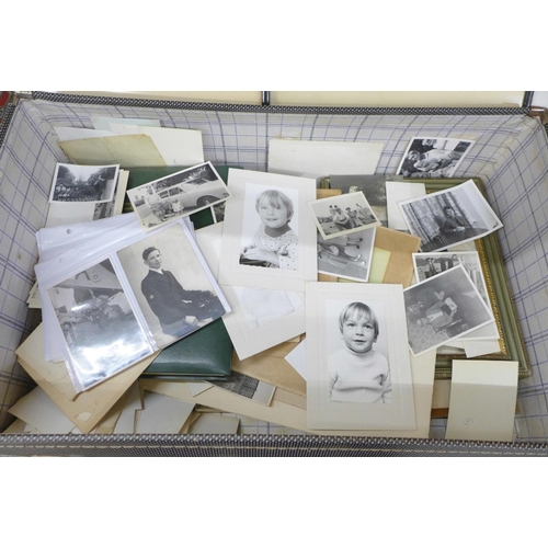 724 - A suitcase containing old photographs