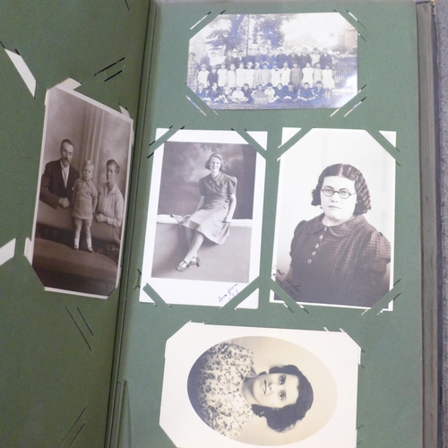 731 - A box of assorted Edwardian postcards and two albums