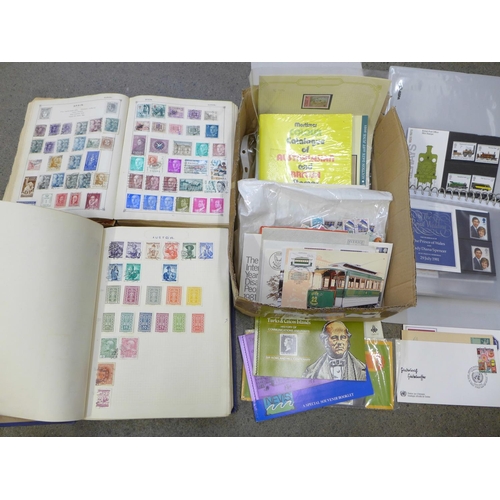 734 - Stamps; a box of stamps, covers, presentation packs, etc.