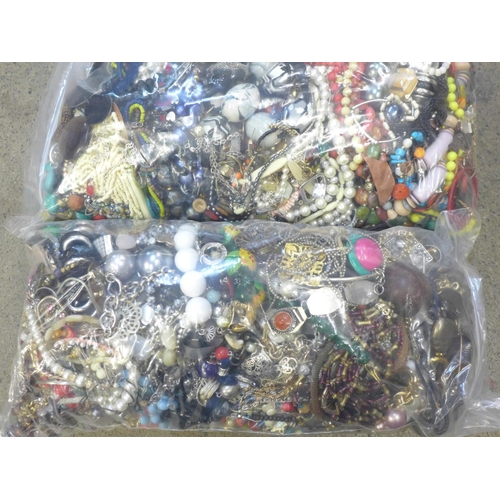 735 - Two large bags of costume jewellery