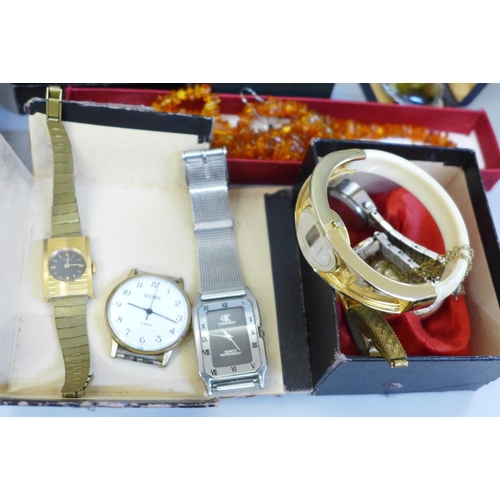 754 - A box of mixed costume jewellery and wristwatches