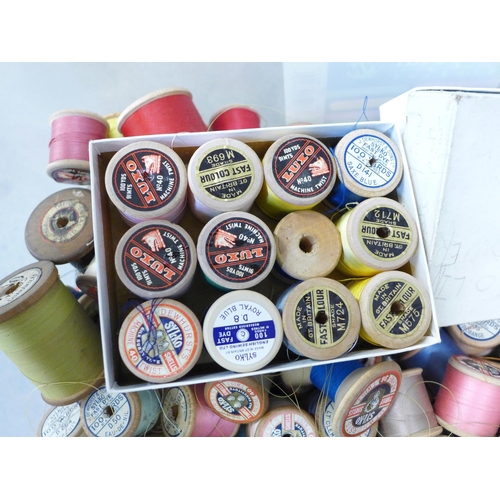 765 - A box of old cotton reels