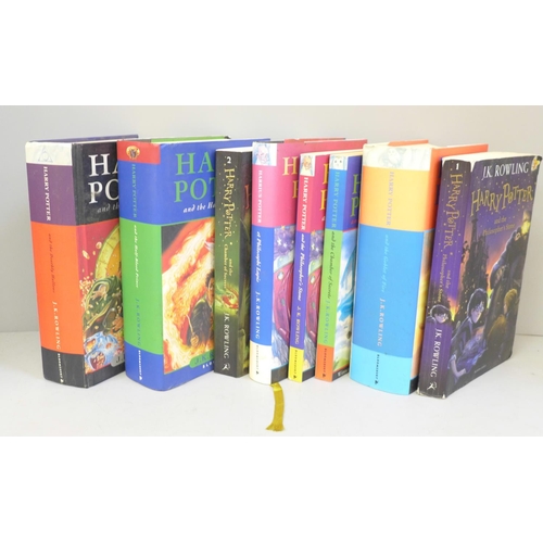 766 - Eight Harry Potter novels; two First Editions