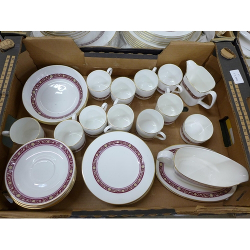 786 - A large collection of Royal Doulton Minuet dinnerware and teaware; tureens, coffee cups saucers, din... 