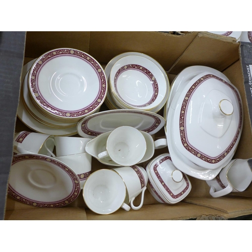 786 - A large collection of Royal Doulton Minuet dinnerware and teaware; tureens, coffee cups saucers, din... 