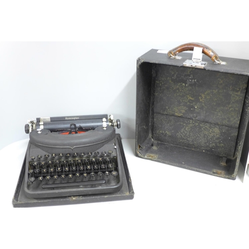 814 - A Remington typewriter with carry case