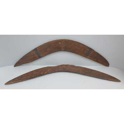 824 - Two carved wooden boomerangs, one a/f