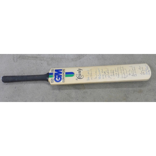 826 - An England cricket bat, signed by Mike Gatting, Gladstone Small, David Gower, Allan Lamb, Bruce Fren... 