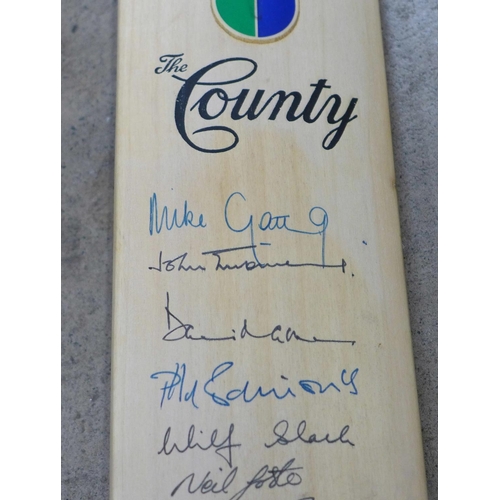 826 - An England cricket bat, signed by Mike Gatting, Gladstone Small, David Gower, Allan Lamb, Bruce Fren... 