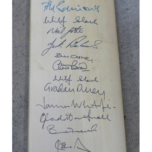 826 - An England cricket bat, signed by Mike Gatting, Gladstone Small, David Gower, Allan Lamb, Bruce Fren... 