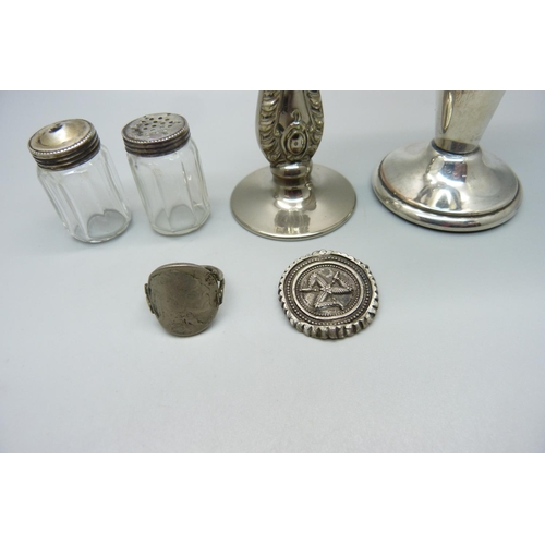 834 - A small silver topped salt and pepper pair, a/f, an Isle of Man brooch lacking pin, a ring made from... 