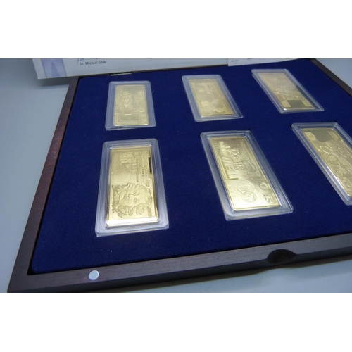 836 - A set of six Pounds Ingots, gold plated copper