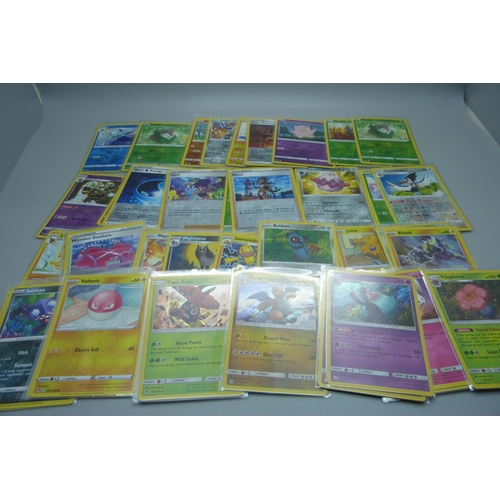 856 - Fifty Holo/Reverse Holo Pokeman cards