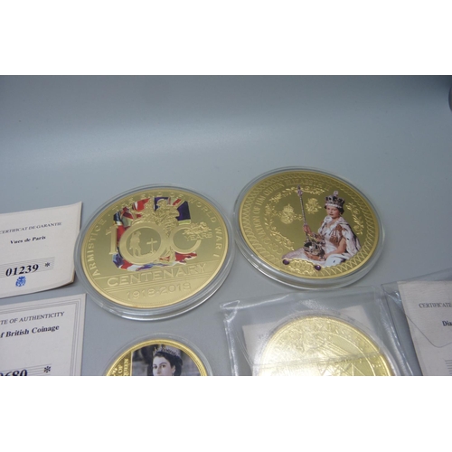 858 - A collection of gold plated and other commemorative coins/medallions