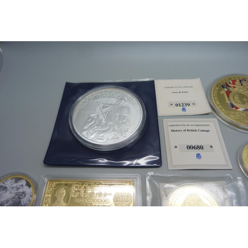 858 - A collection of gold plated and other commemorative coins/medallions