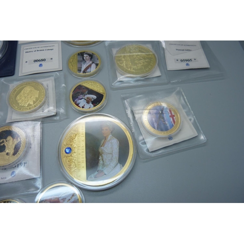 858 - A collection of gold plated and other commemorative coins/medallions