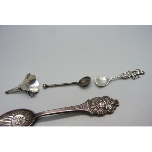 864 - Two silver condiment spoons, a silver scent bottle funnel, marked 925 and three Rolex spoons