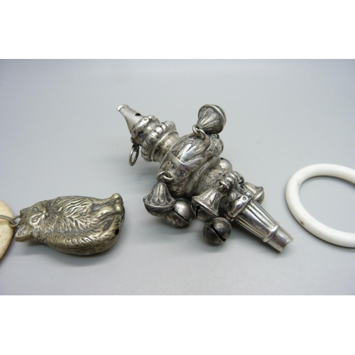 866 - A Victorian silver rattle/whistle, Birmingham 1896, a Teddy bear rattle and a cat rattle