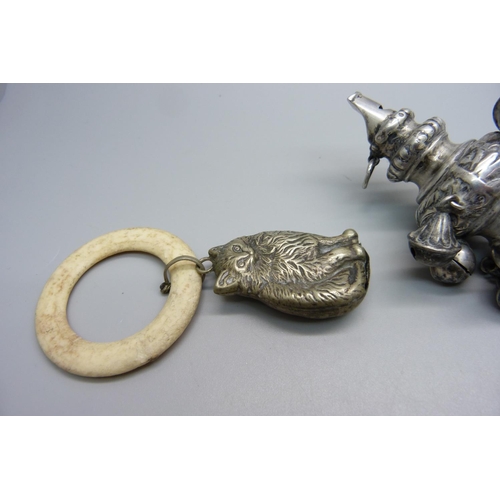 866 - A Victorian silver rattle/whistle, Birmingham 1896, a Teddy bear rattle and a cat rattle