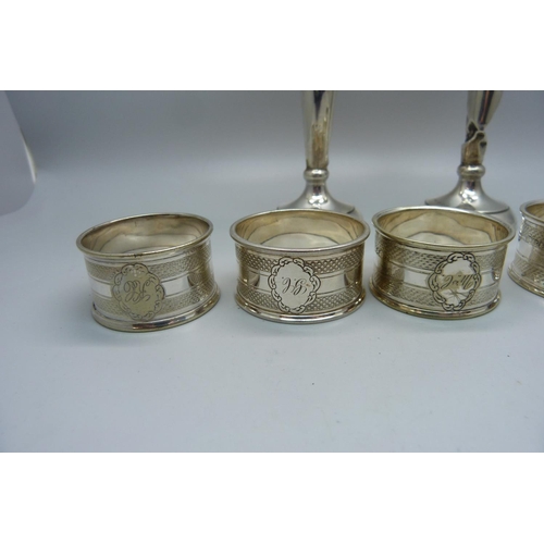 875 - A pair of silver vases, a/f, and five plated napkin rings