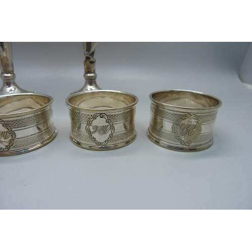 875 - A pair of silver vases, a/f, and five plated napkin rings