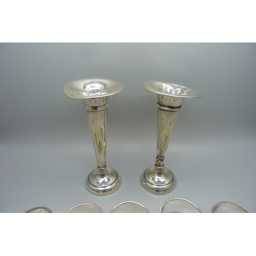 875 - A pair of silver vases, a/f, and five plated napkin rings