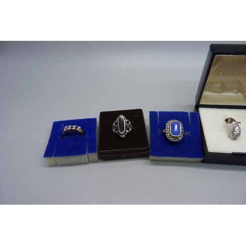 889 - Six silver rings including one with Scottish hallmark