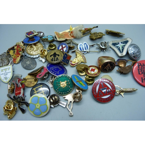 896 - A Masonic ring and assorted badges, etc.