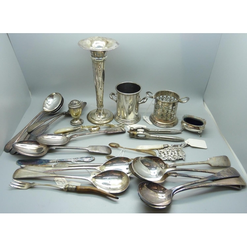 925 - A collection of plated ware including cutlery and condiments, a silver posy vase and a silver pepper... 