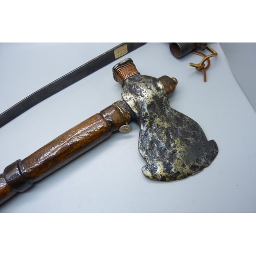 928 - An 18th Century French bayonet and an axe