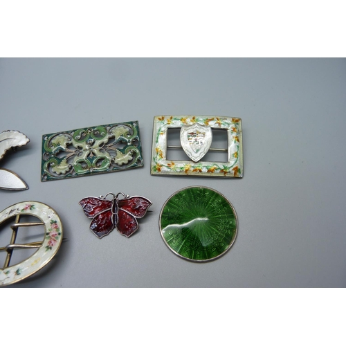 958 - Five silver and enamel brooches including a large  Norwegian flower brooch, a green circular plaque ... 