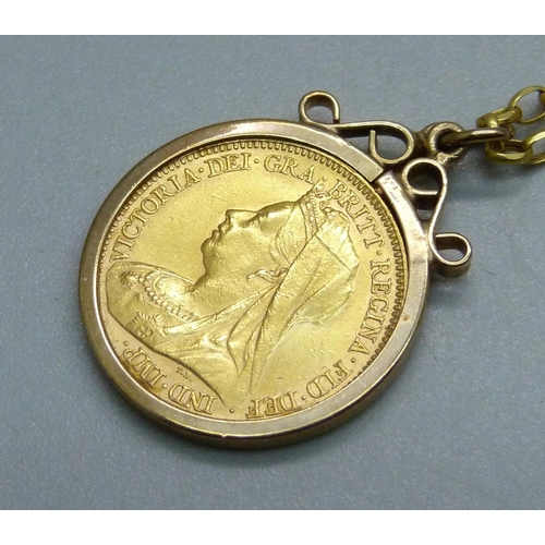 978 - A Queen Victoria 1900 gold half-sovereign in a 9ct gold pendant mount and on a 9ct gold chain, total... 