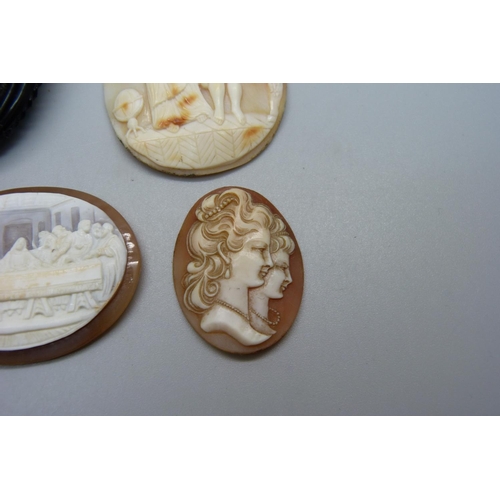 983 - A cameo brooch and four unmounted carved cameos including The Last Supper